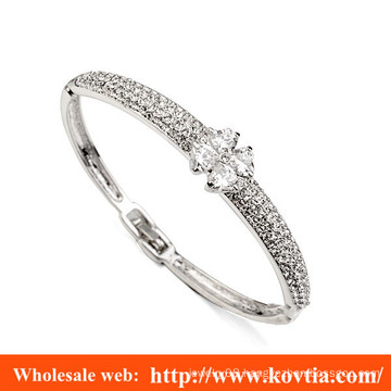 Women elegant white gold and white diamond inaly bangle